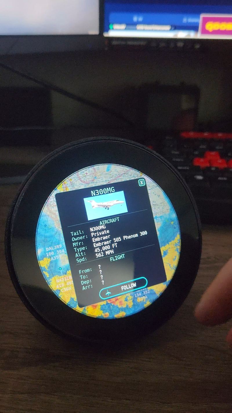 SkyWatch circular display on a desk